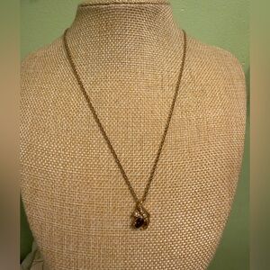 Elegant Gold Necklace with Purple and White Gemstones